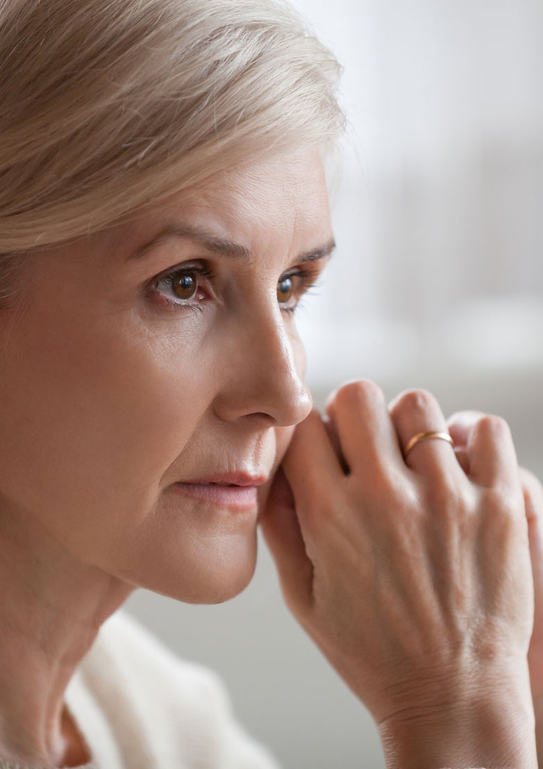 Concerned elderly woman