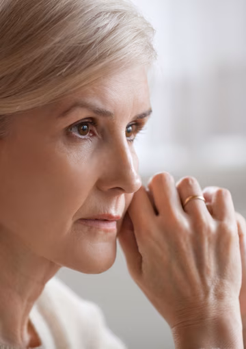 Concerned elderly woman