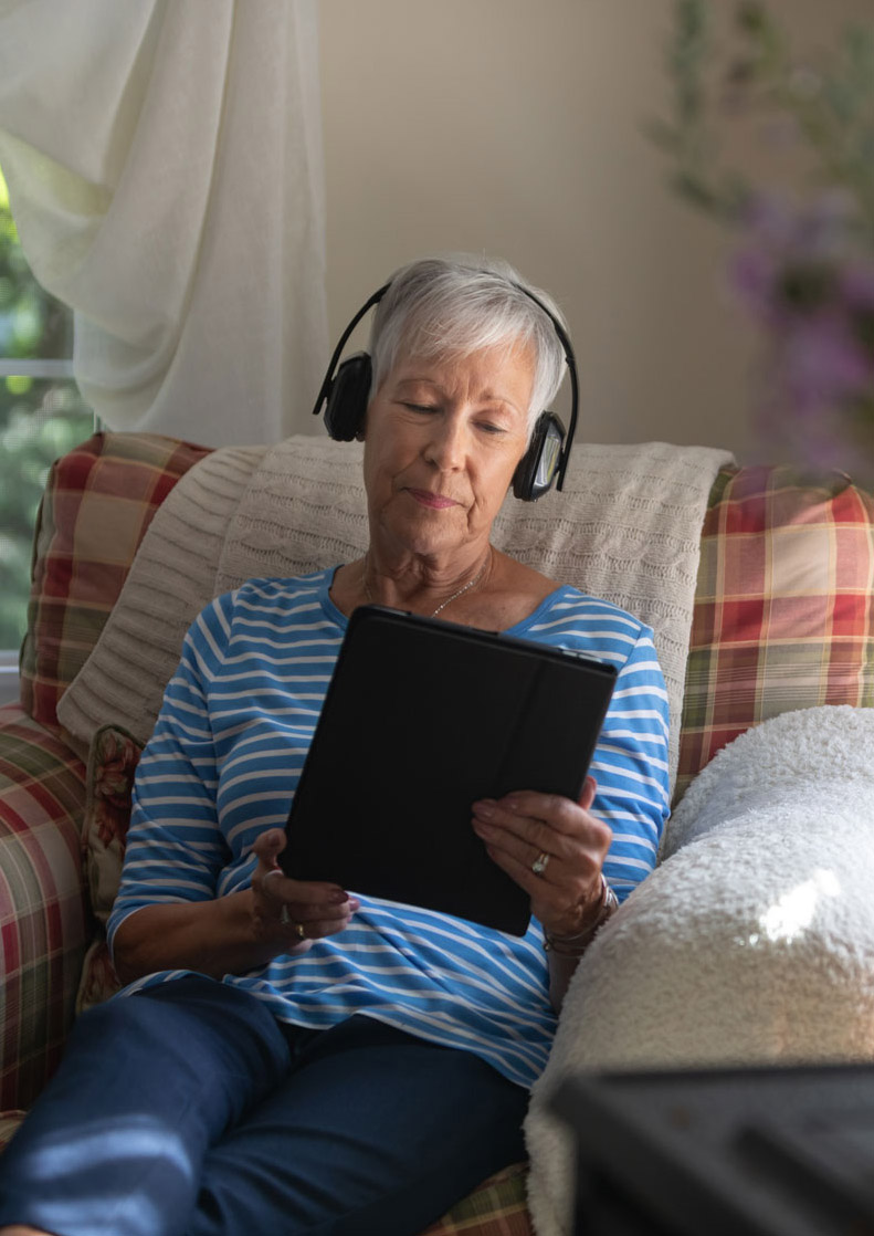 Elderly woman with ipad