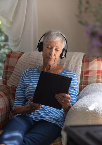 Elderly woman with ipad