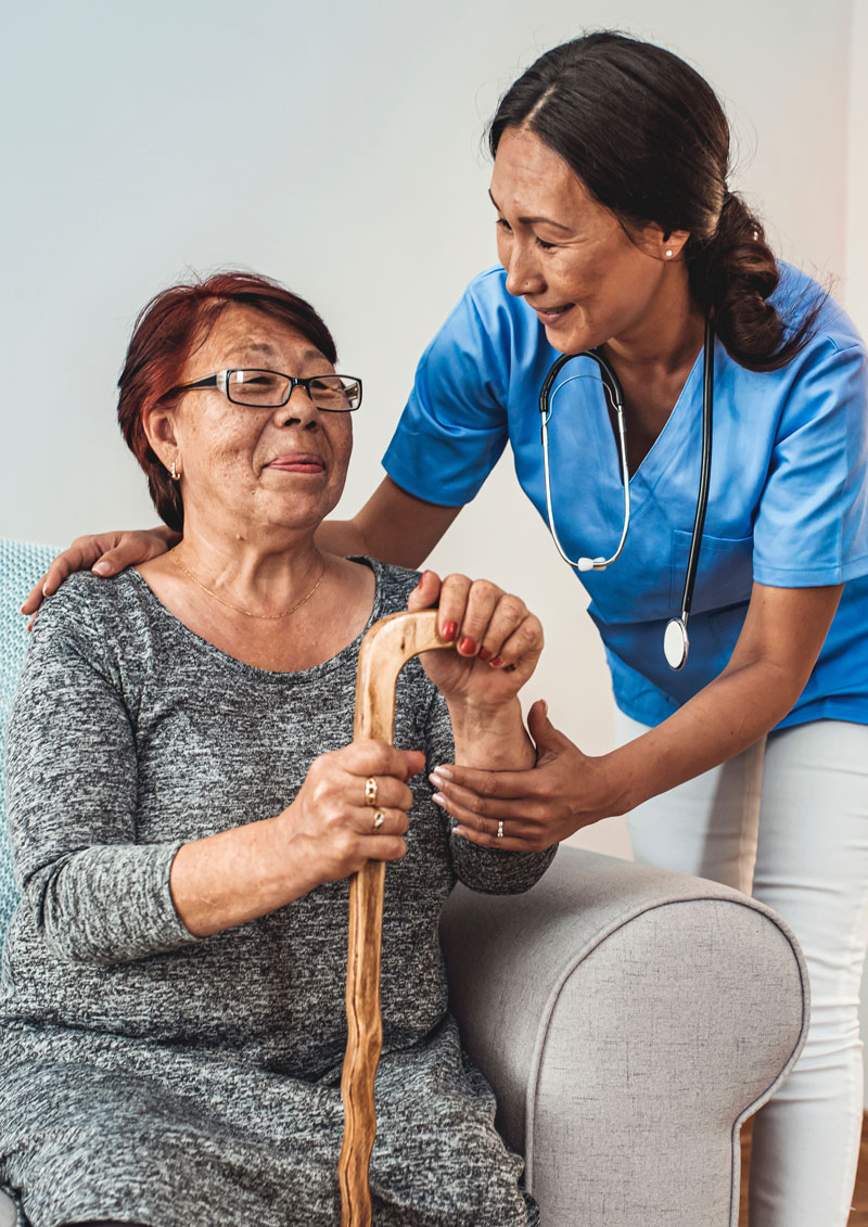 Senior woman and paid carer