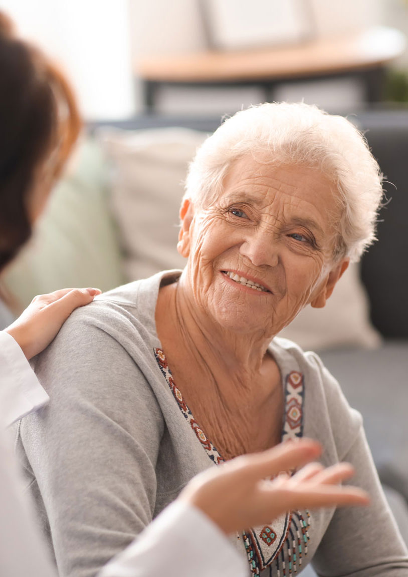 Senior woman getting advice from another woman