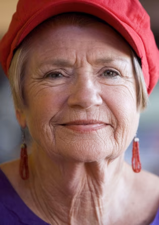 Senior woman in red hat