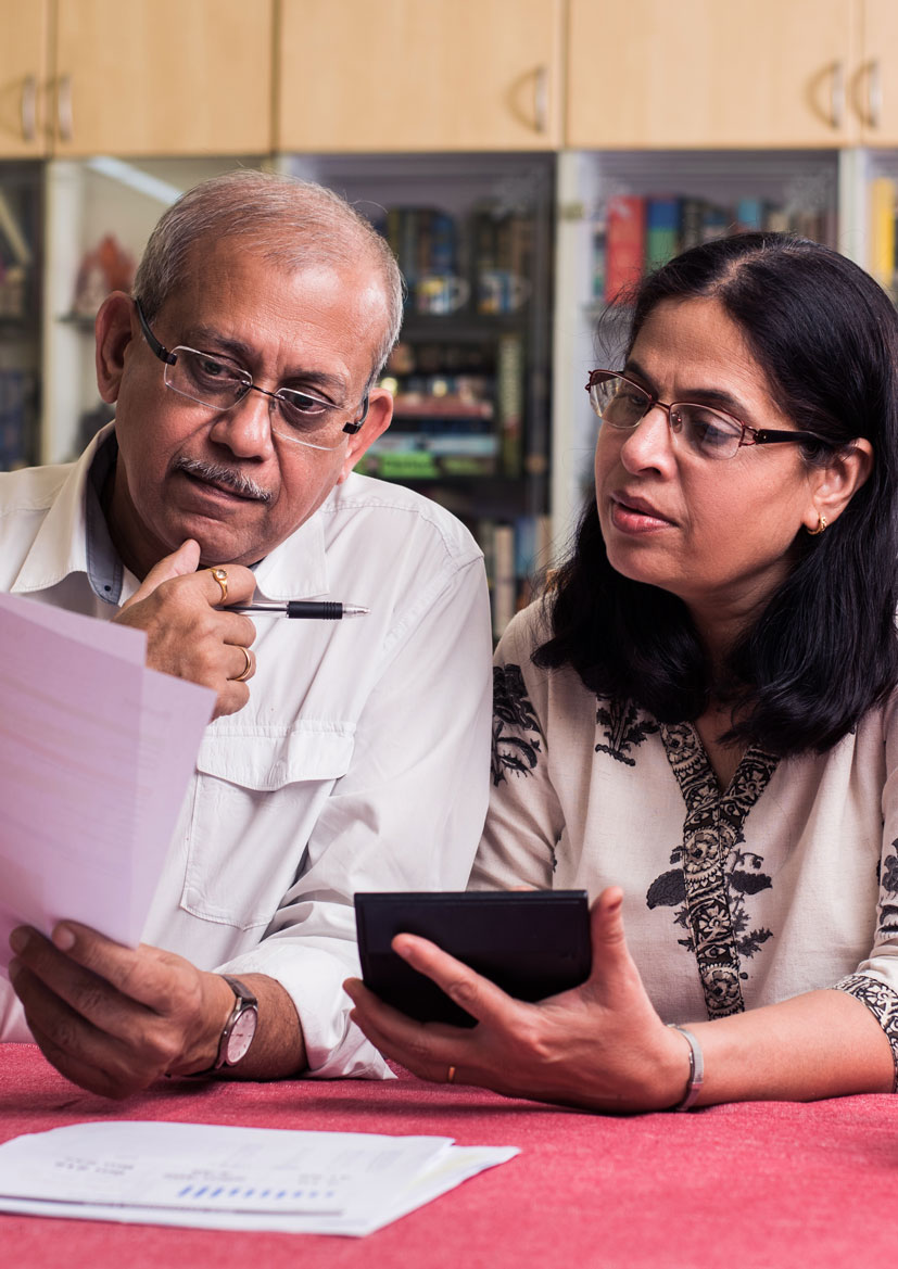 Senior couple looking over their finances