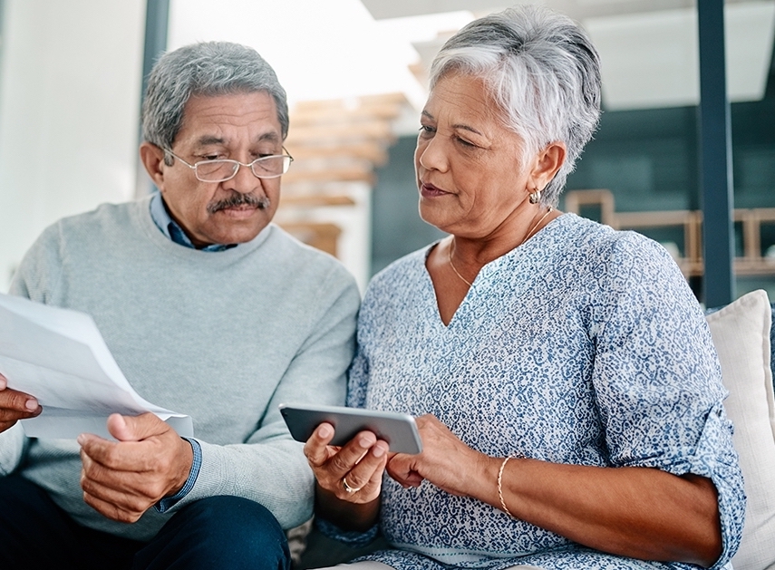 Senior couple looking at documents