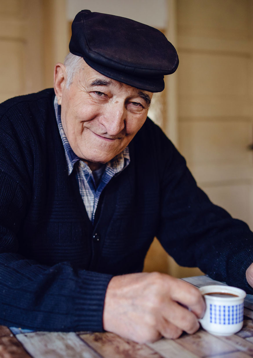 Elderly man with coffee