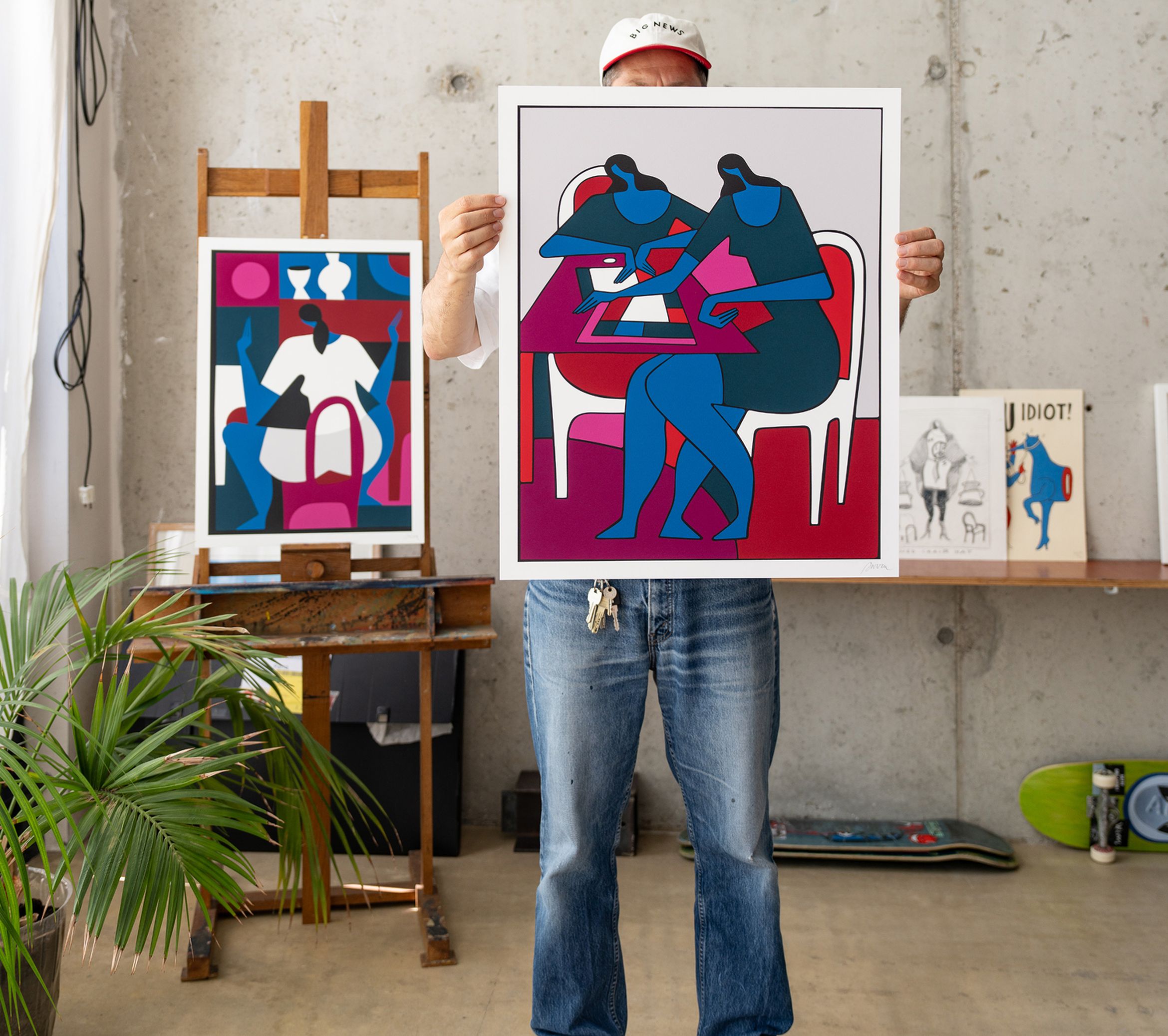 Parra in his studio holding a new limited edition print
