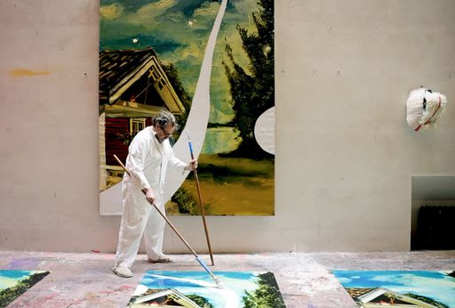 Julian Schnabel painting using a long, broom-like paintbrush Julian Schnabel painting using a long, broom-like paintbrush