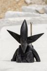 marble sculpture in black of a futuristic character marble sculpture in black of a futuristic character