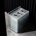 three photographic prints by Gregory Crewdson on a drying rack in the Avant Arte warehouse three photographic prints by Gregory Crewdson on a drying rack in the Avant Arte warehouse