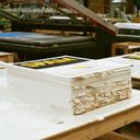 a stack of limited edition prints by Ed Ruscha, meticulously annotated with condition notes a stack of limited edition prints by Ed Ruscha, meticulously annotated with condition notes