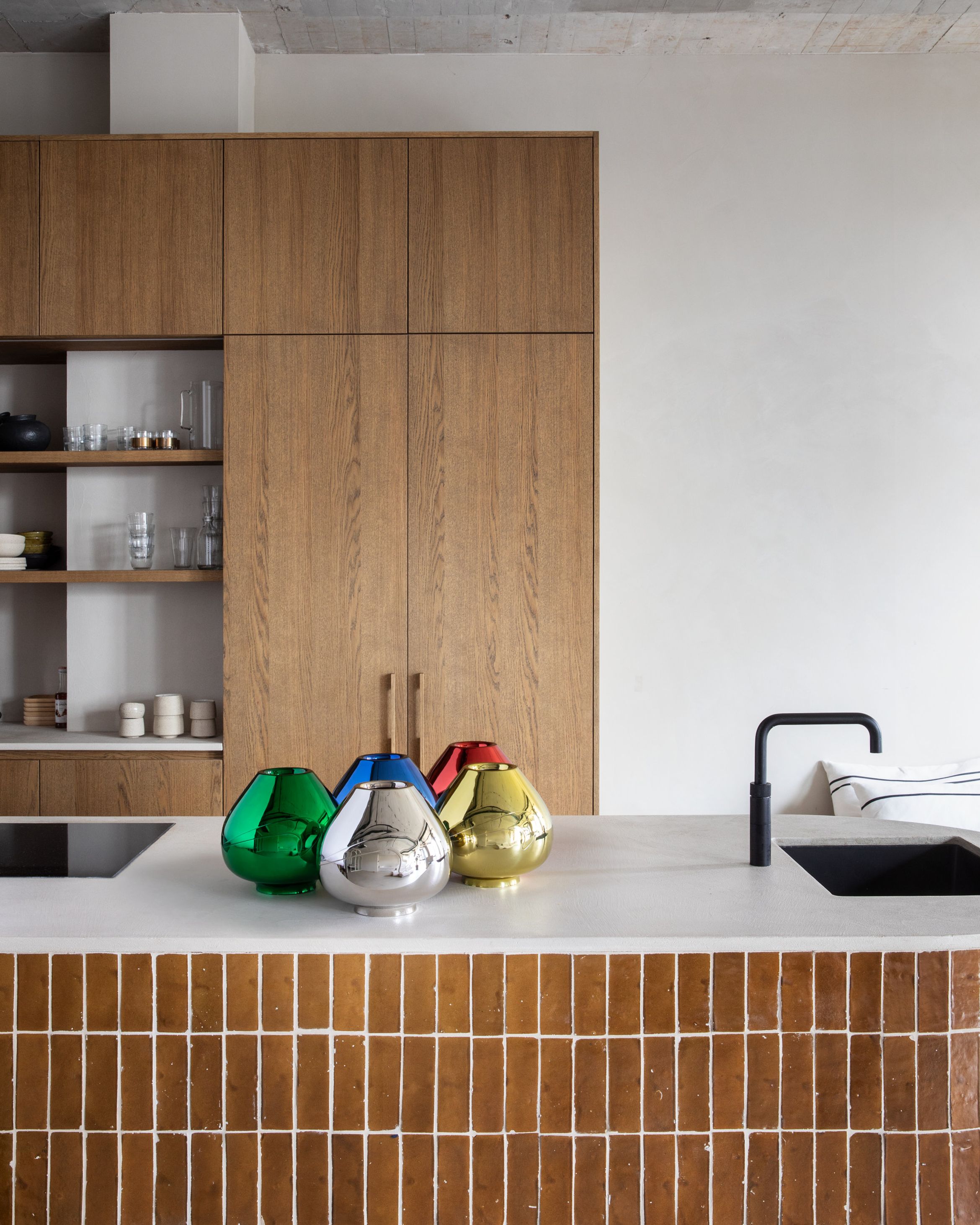 An image of Ai Weiwei vases in a kitchen.
