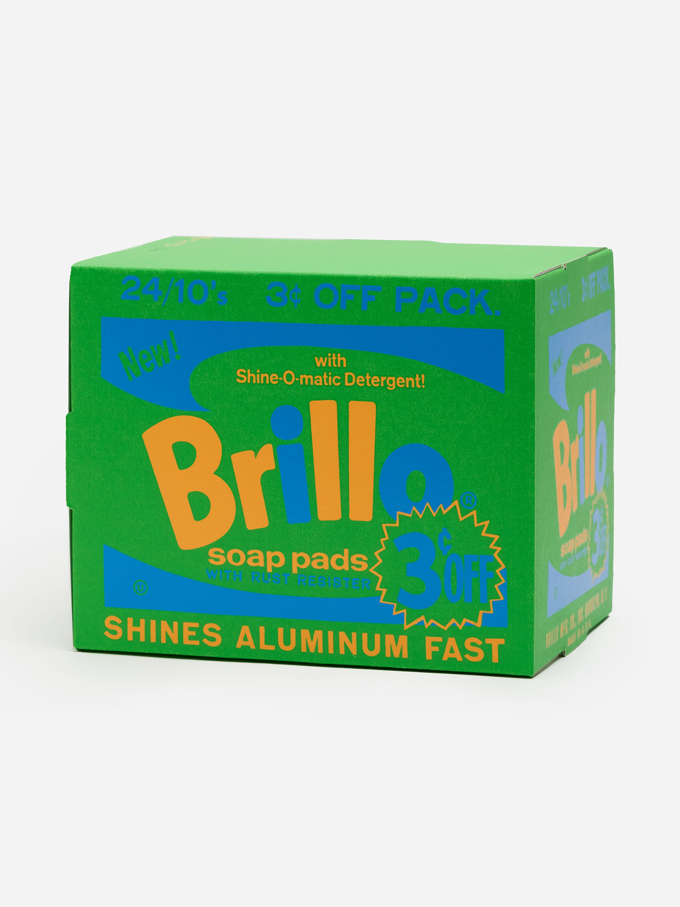 A green box of Brillo soap pads with orange and blue text offering 3 cents off. It promotes Shine-O-matic Detergent and fast aluminum shining. A green box of Brillo soap pads with orange and blue text offering 3 cents off. It promotes Shine-O-matic Detergent and fast aluminum shining.
