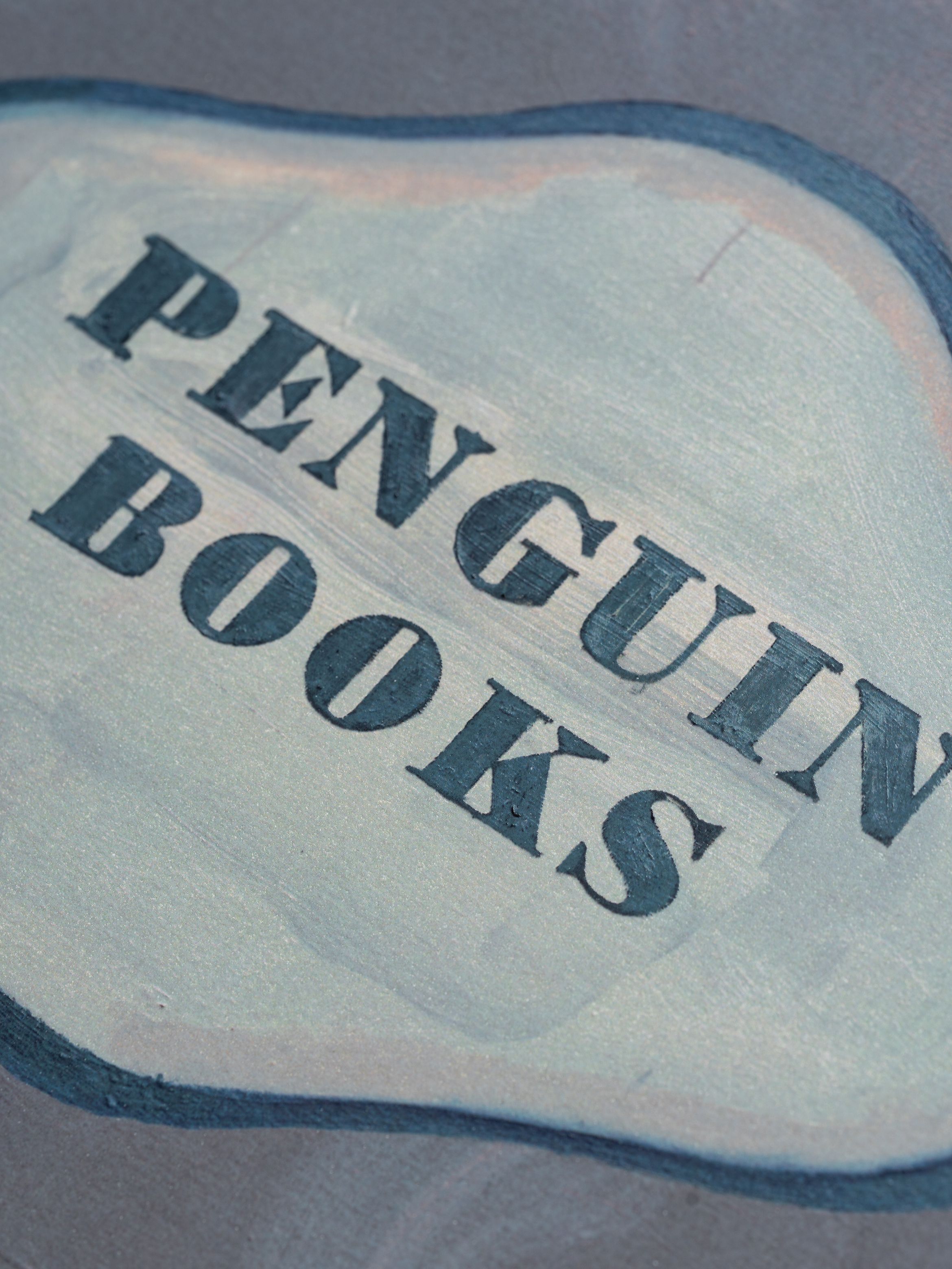 On-angle detail of a silkscreen print by Harland Miller.