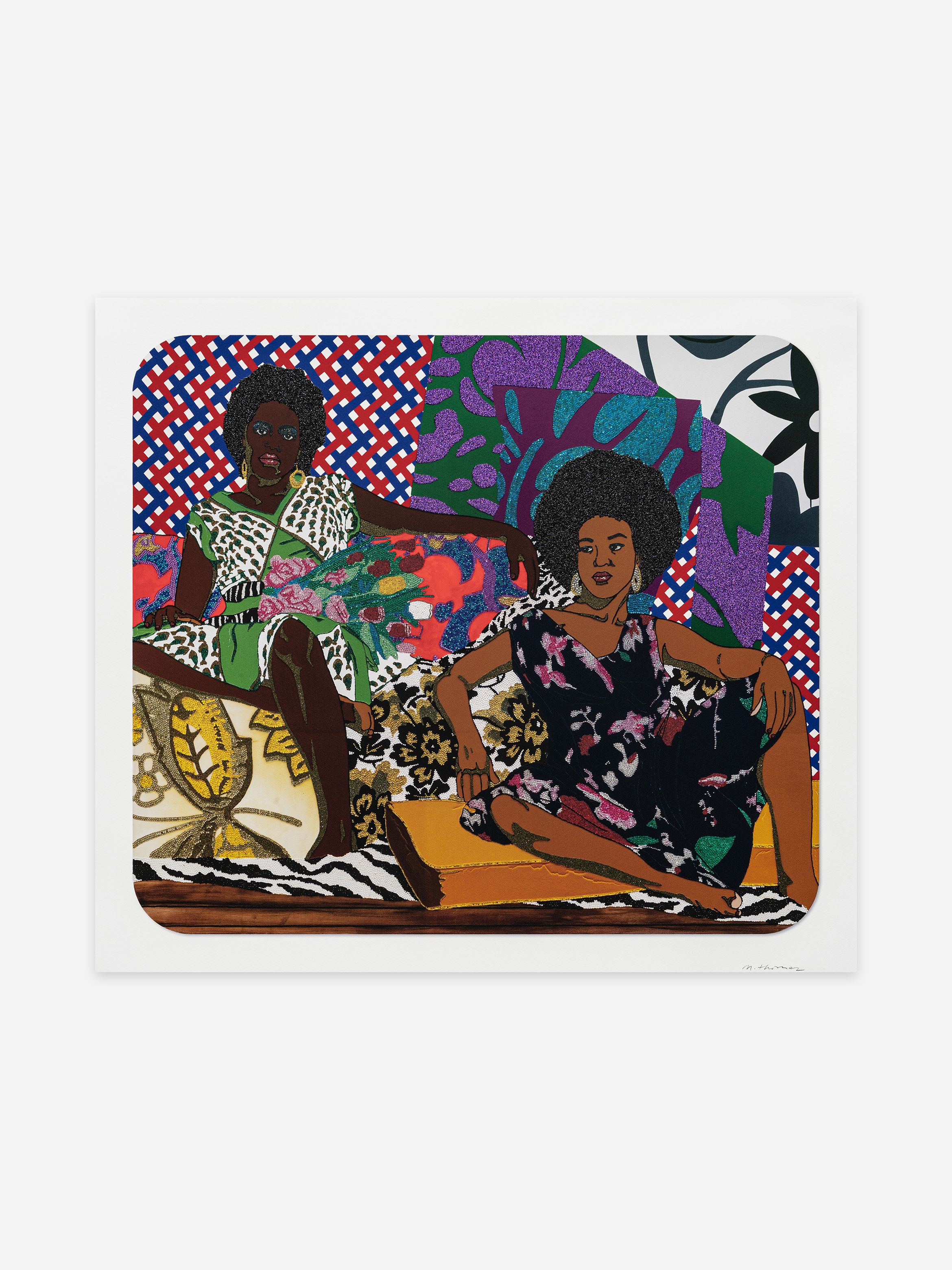 Two women with afros sit in a colourful setting, featuring vibrant patterns and floral designs in the background.