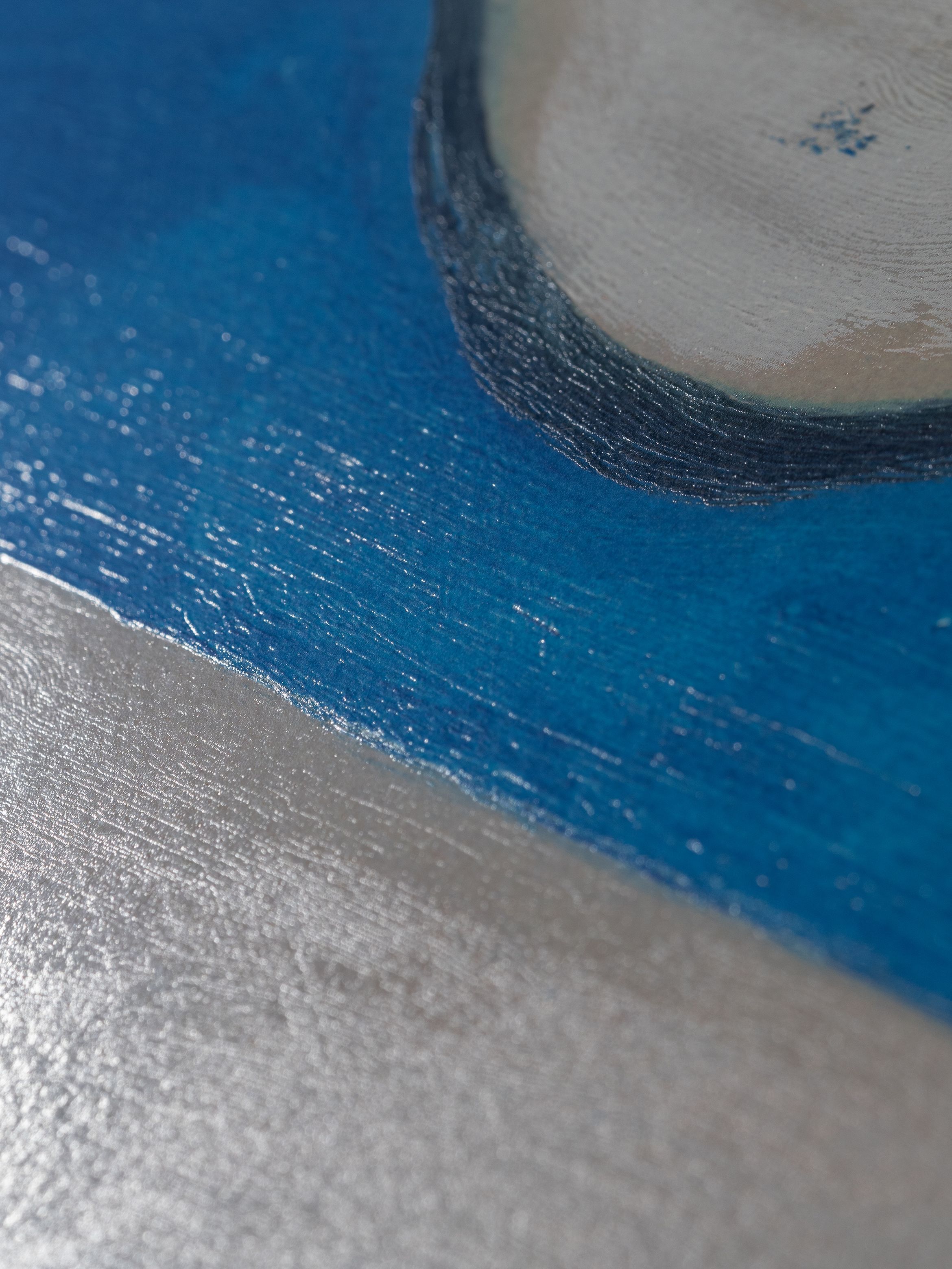 On-angle detail of a silkscreen print by Harland Miller.