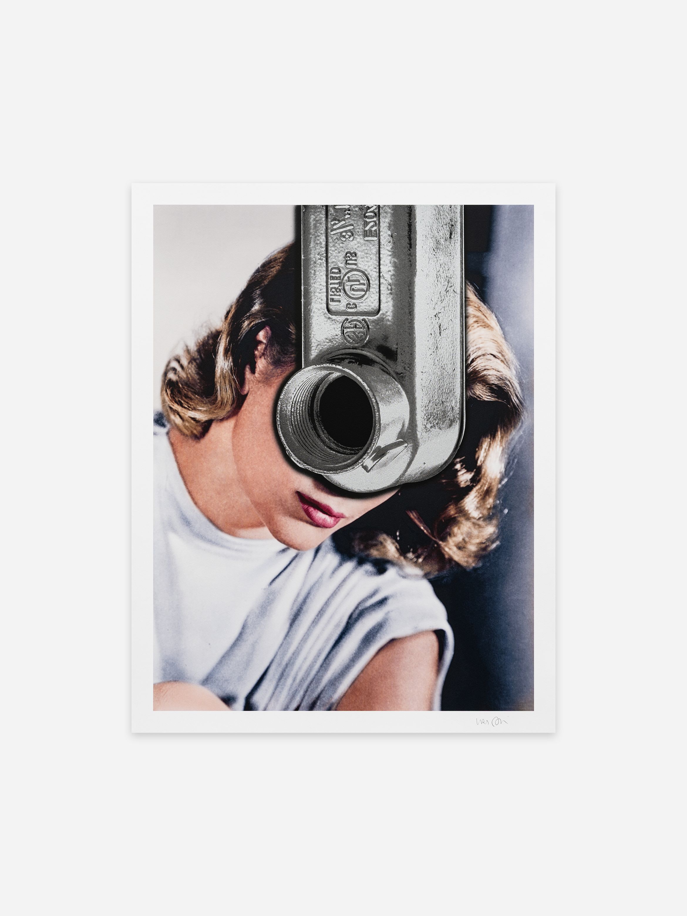 Surreal artwork of a woman with a metallic object over her face, blending photography and industrial elements.