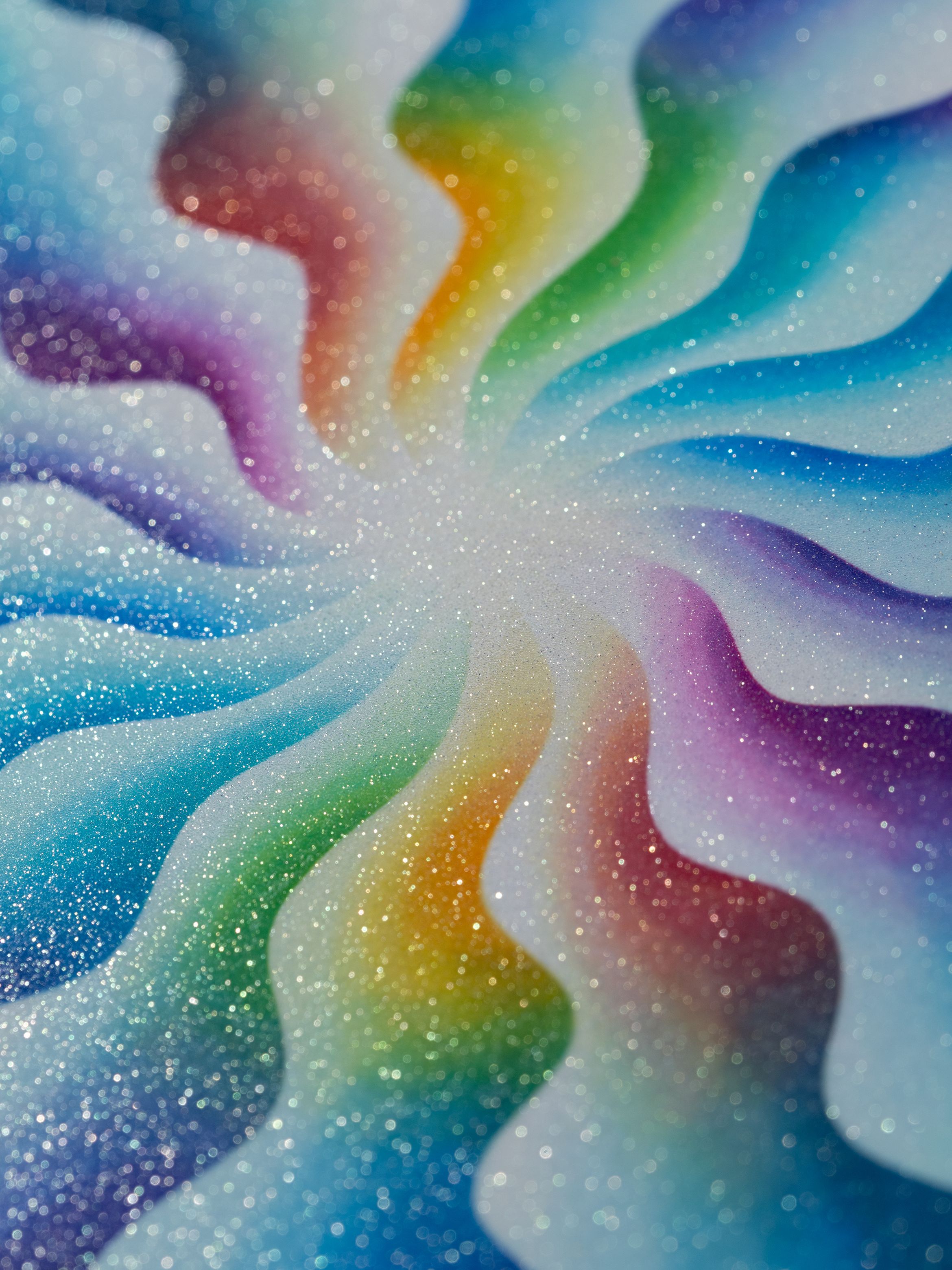 Colourful abstract pattern with wavy lines and a sparkling texture, featuring a spectrum of rainbow hues converging towards the centre.