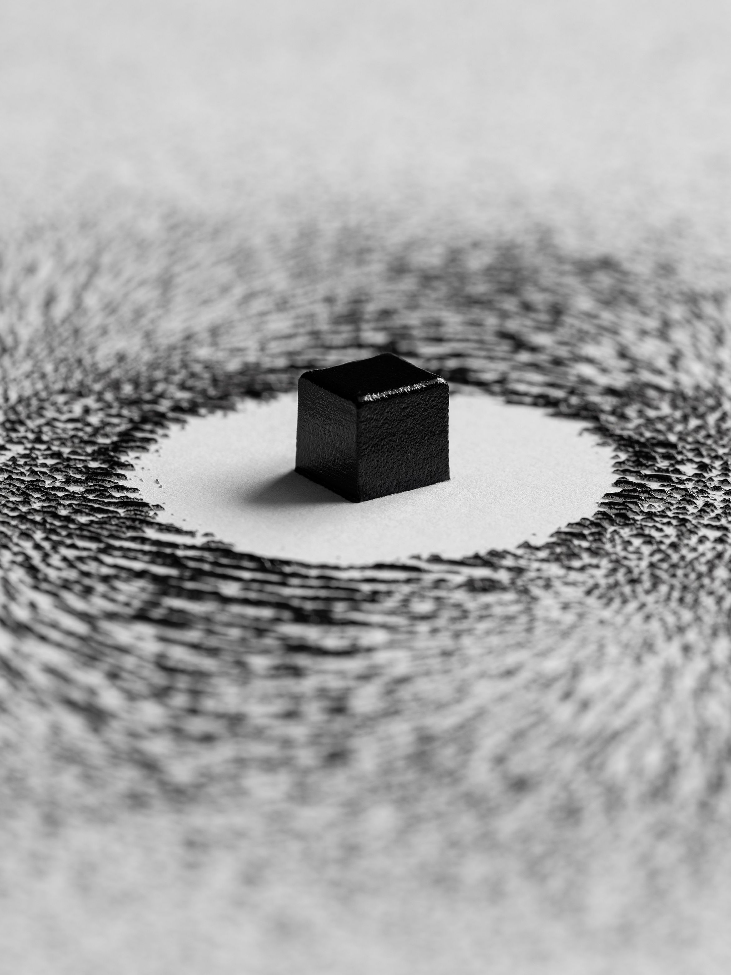 On-angle detail of a textured archival pigment by Ahmed Mater