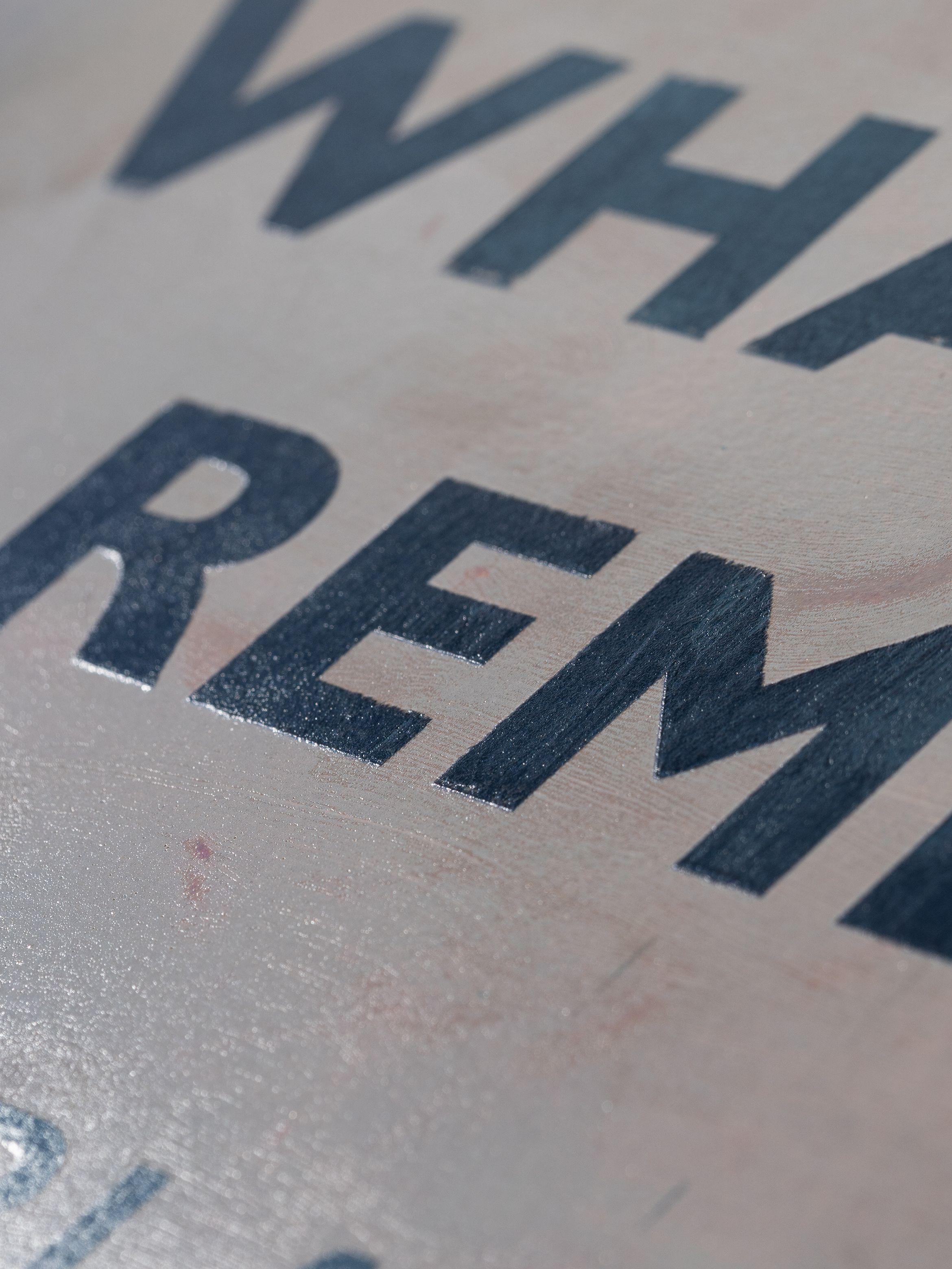 On-angle detail of a silkscreen print by Harland Miller.