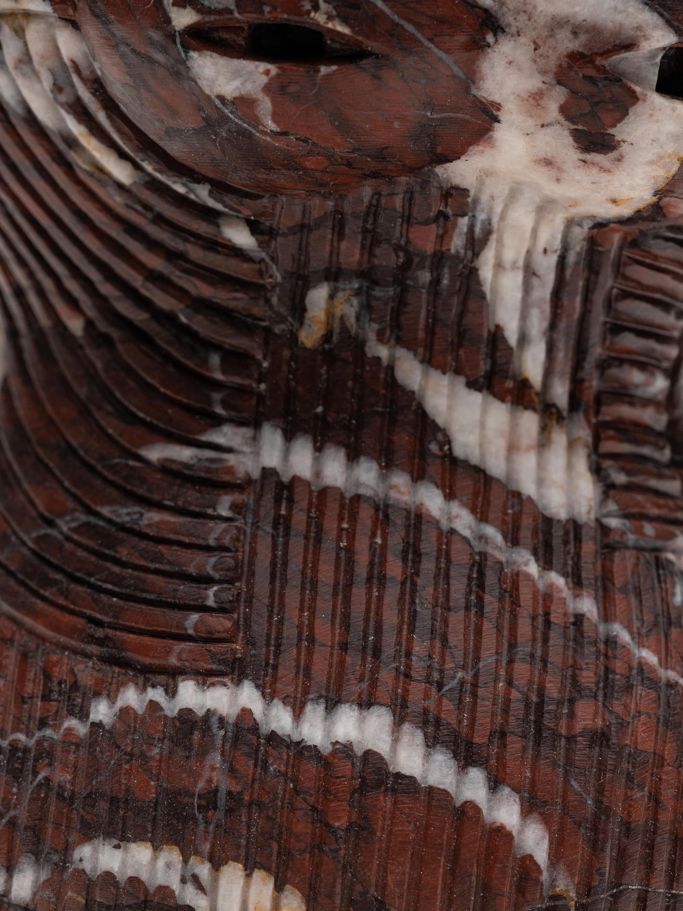 On-angle detail of a marble sculpture by En Iwamura.