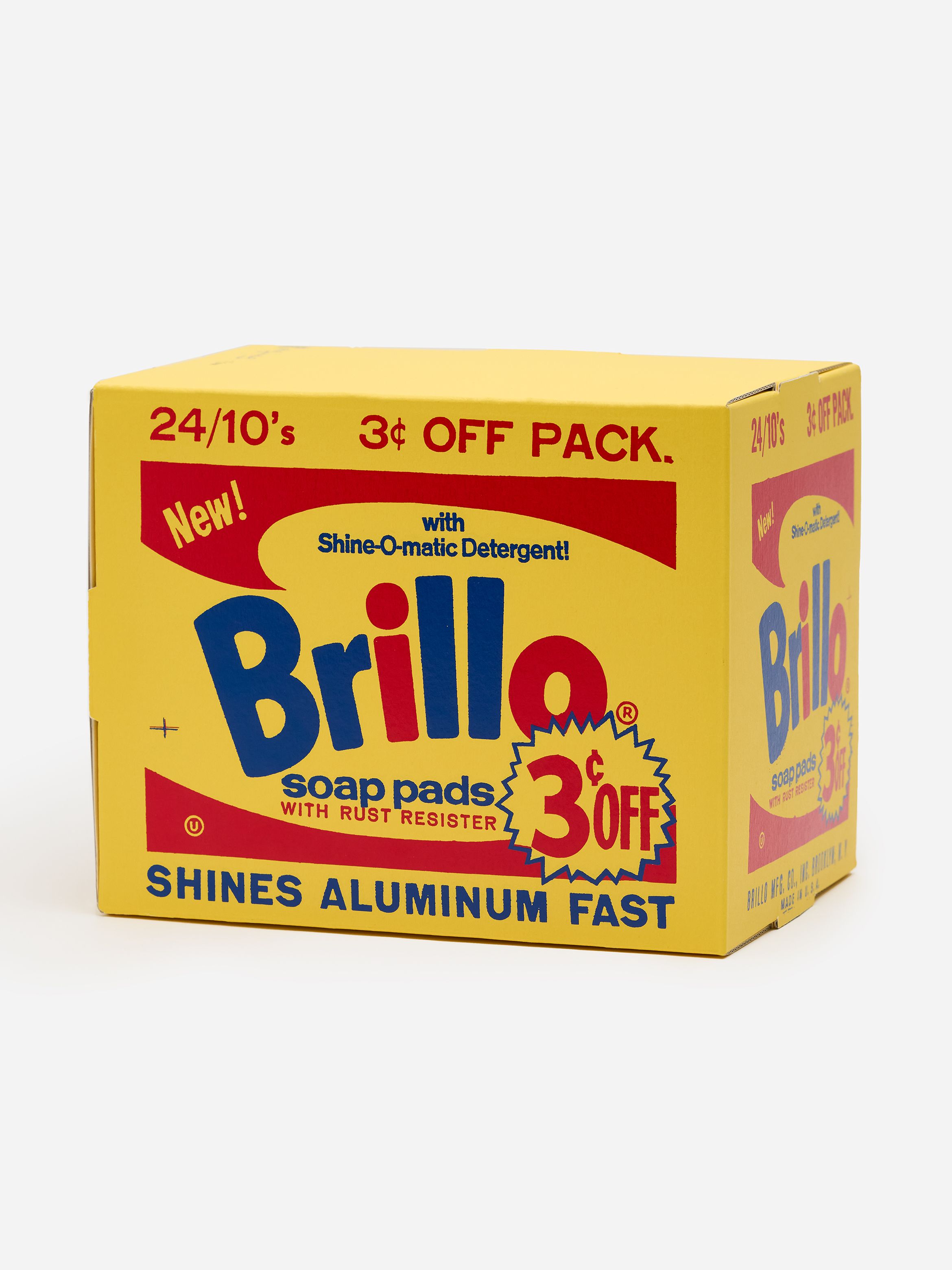 A yellow box of Brillo soap pads featuring a "3¢ off" promotion, highlighting Shine-O-matic Detergent and rust resistance for aluminum cleaning.