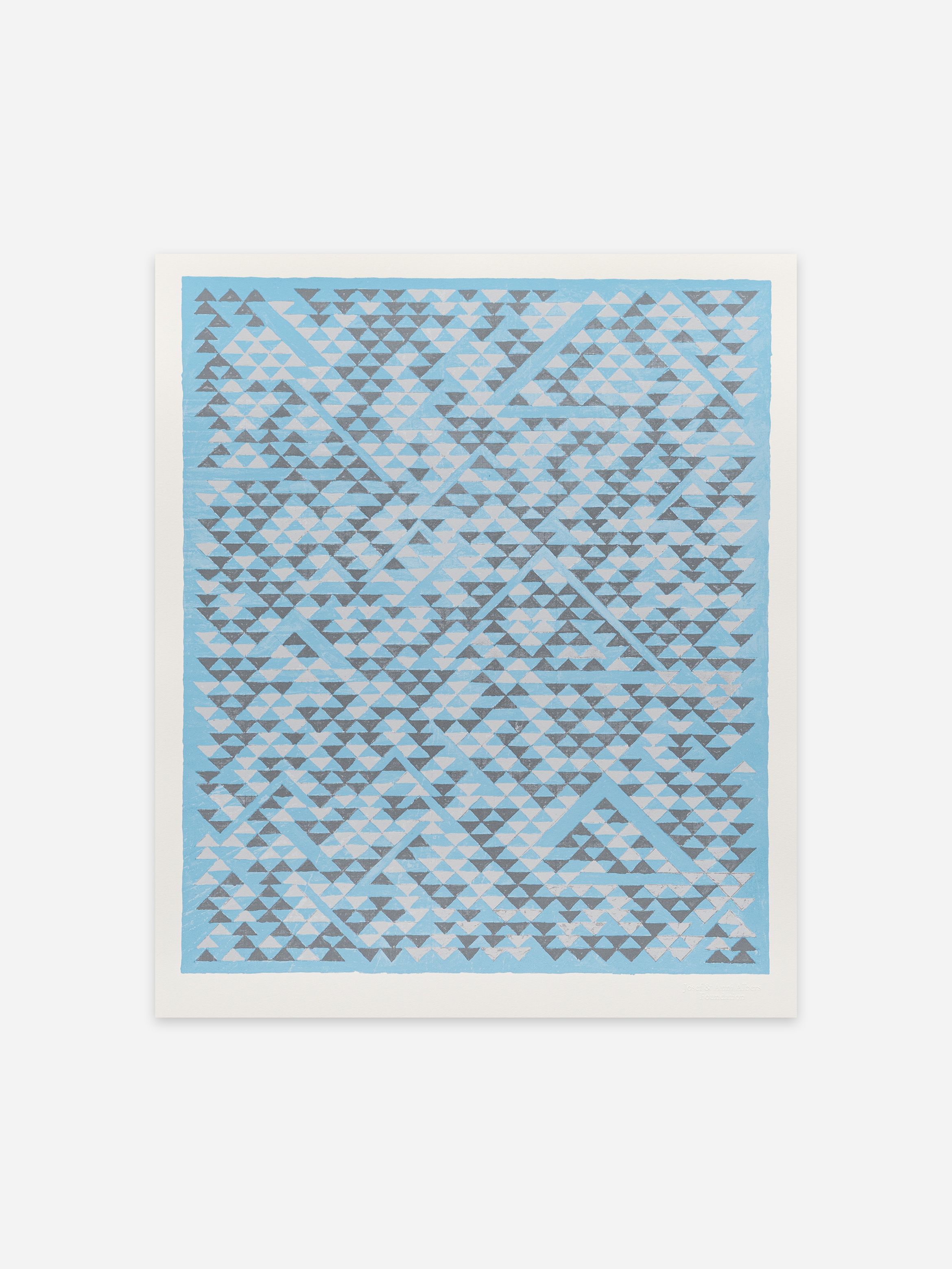 Abstract artwork featuring a pattern of blue and grey triangles forming geometric shapes on a light background.