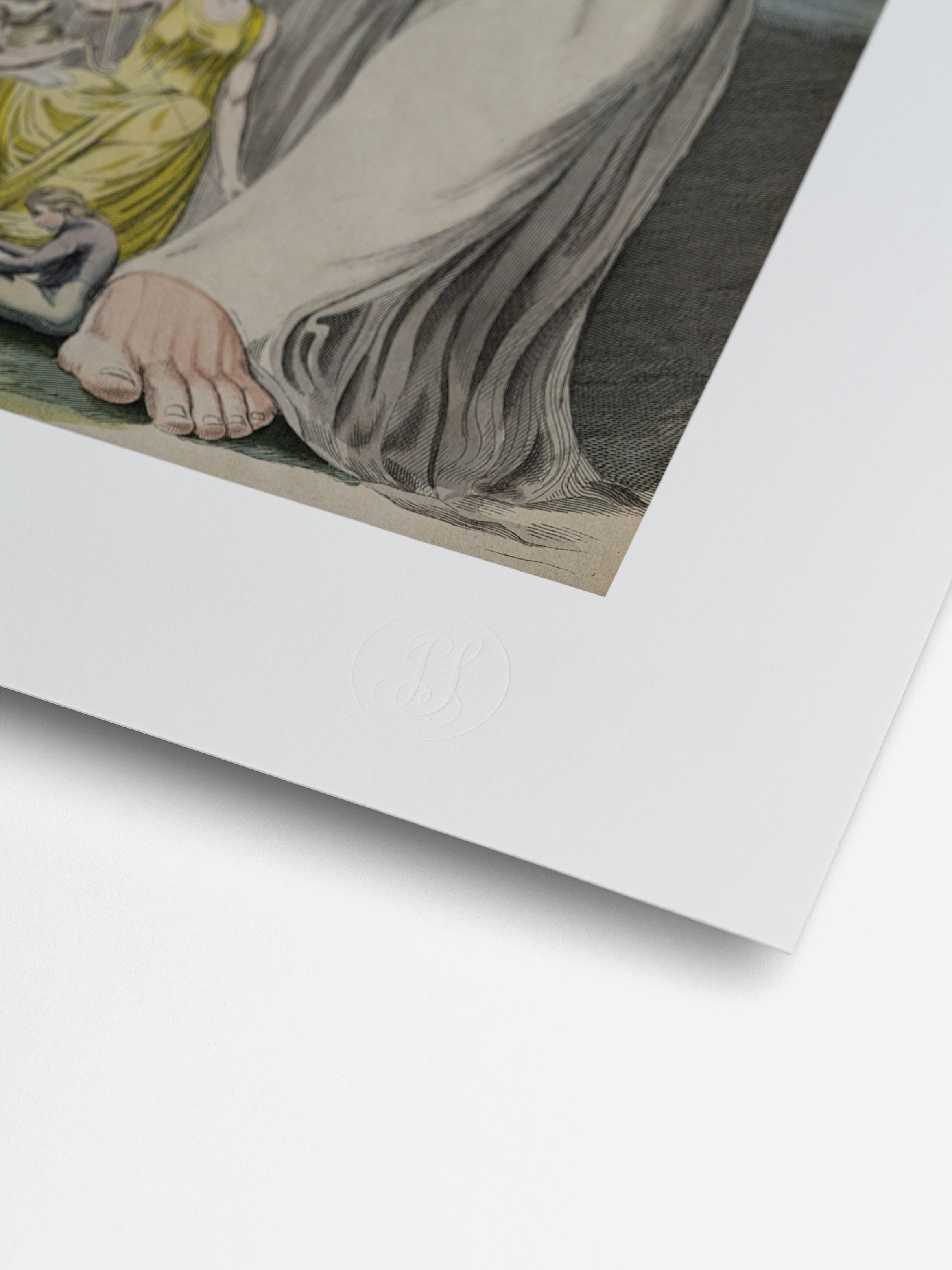 Close-up of a print's corner showing an embossed logo, with a portion of an illustrated scene featuring a foot and figures in the background.