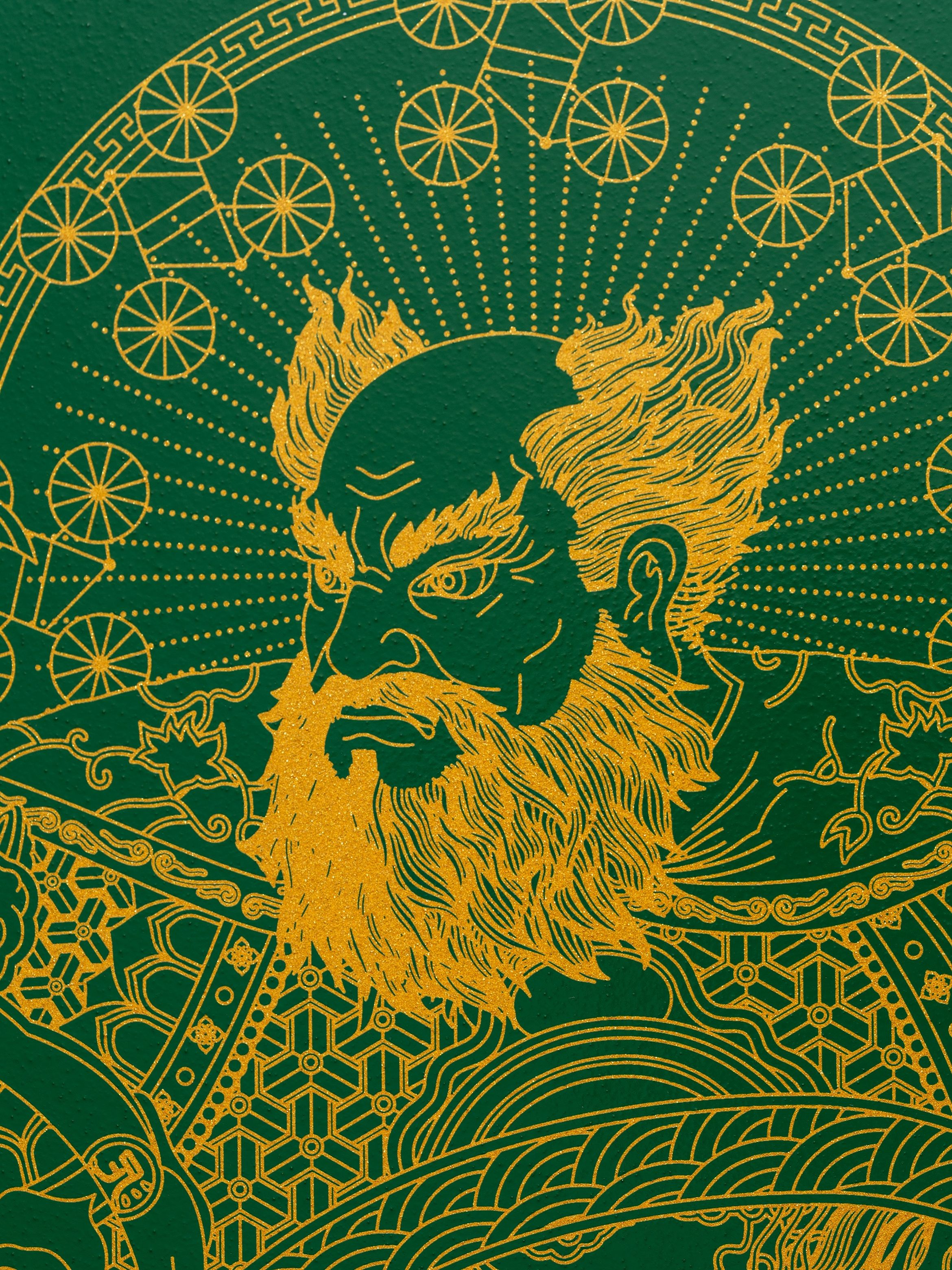 Intricate golden line art on green background depicting a fierce, mythical figure with a flowing beard and ornate celestial patterns.