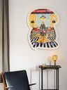 framed print on wall above tall black table and leather armchair framed print on wall above tall black table and leather armchair