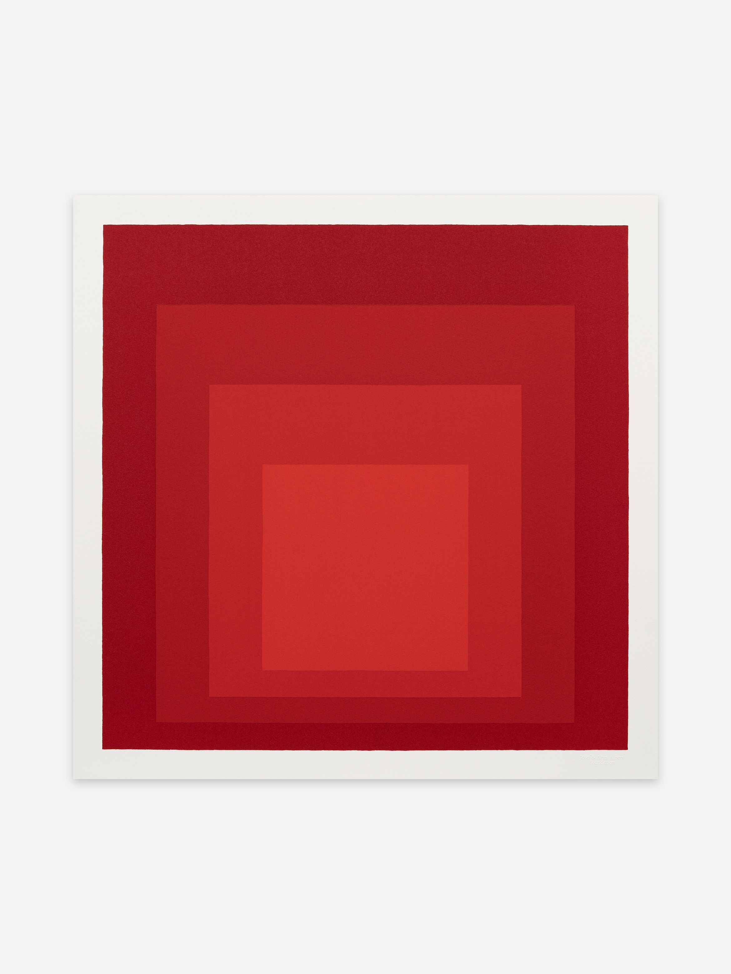 Abstract art of concentric red squares on a white background, each square varying in shade, creating a gradient effect.