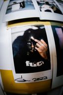 Polaroid image of artist Slawn showing the middle finger Polaroid image of artist Slawn showing the middle finger