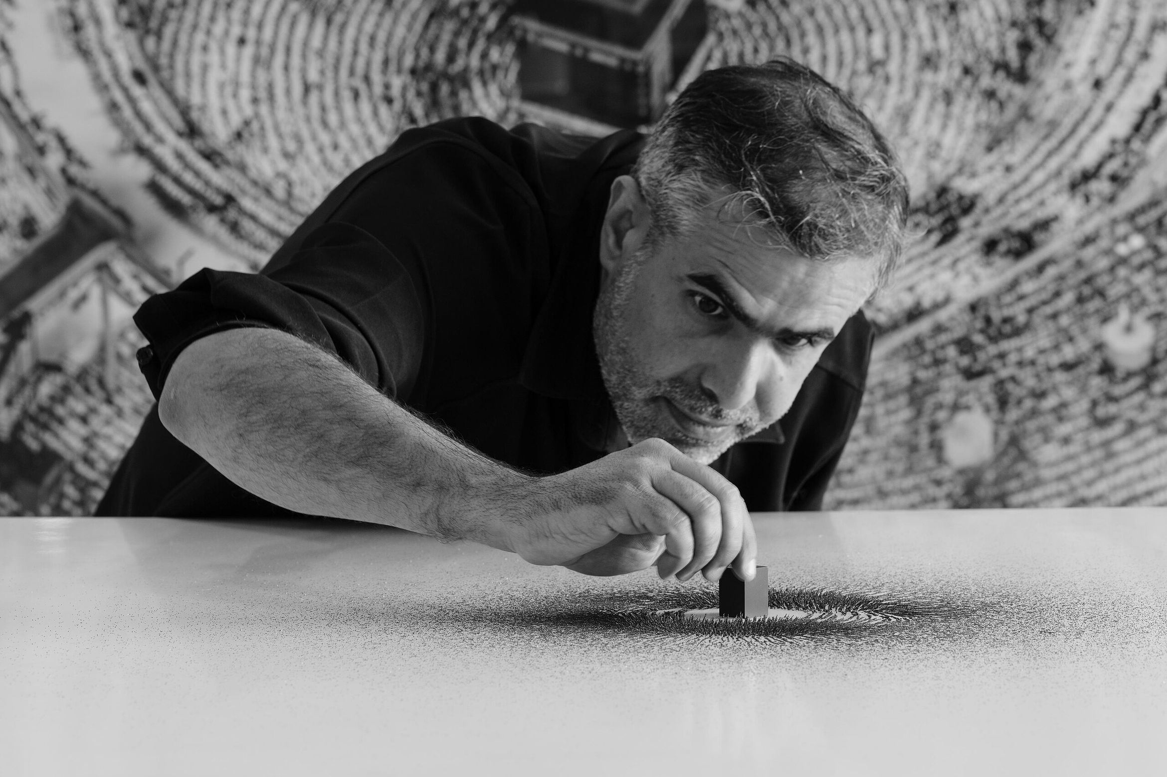 Ahmed Mater in his studio "tuning" 'Magnetism'