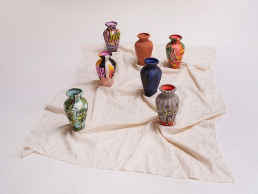 septet of hand-painted amphorae arranged on a warped linen sheet septet of hand-painted amphorae arranged on a warped linen sheet