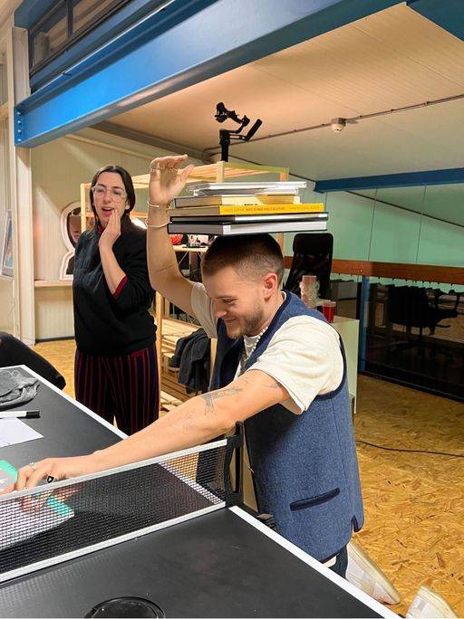 Someone is holding books on his head Someone is holding books on his head