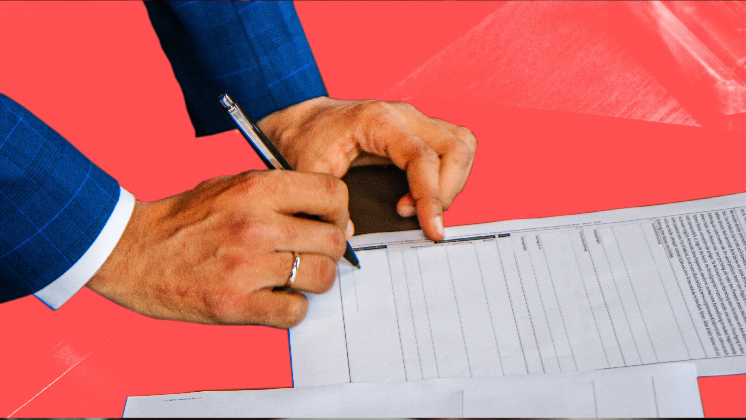 A small business owner signing a contract following successful contract negotiation strategy 