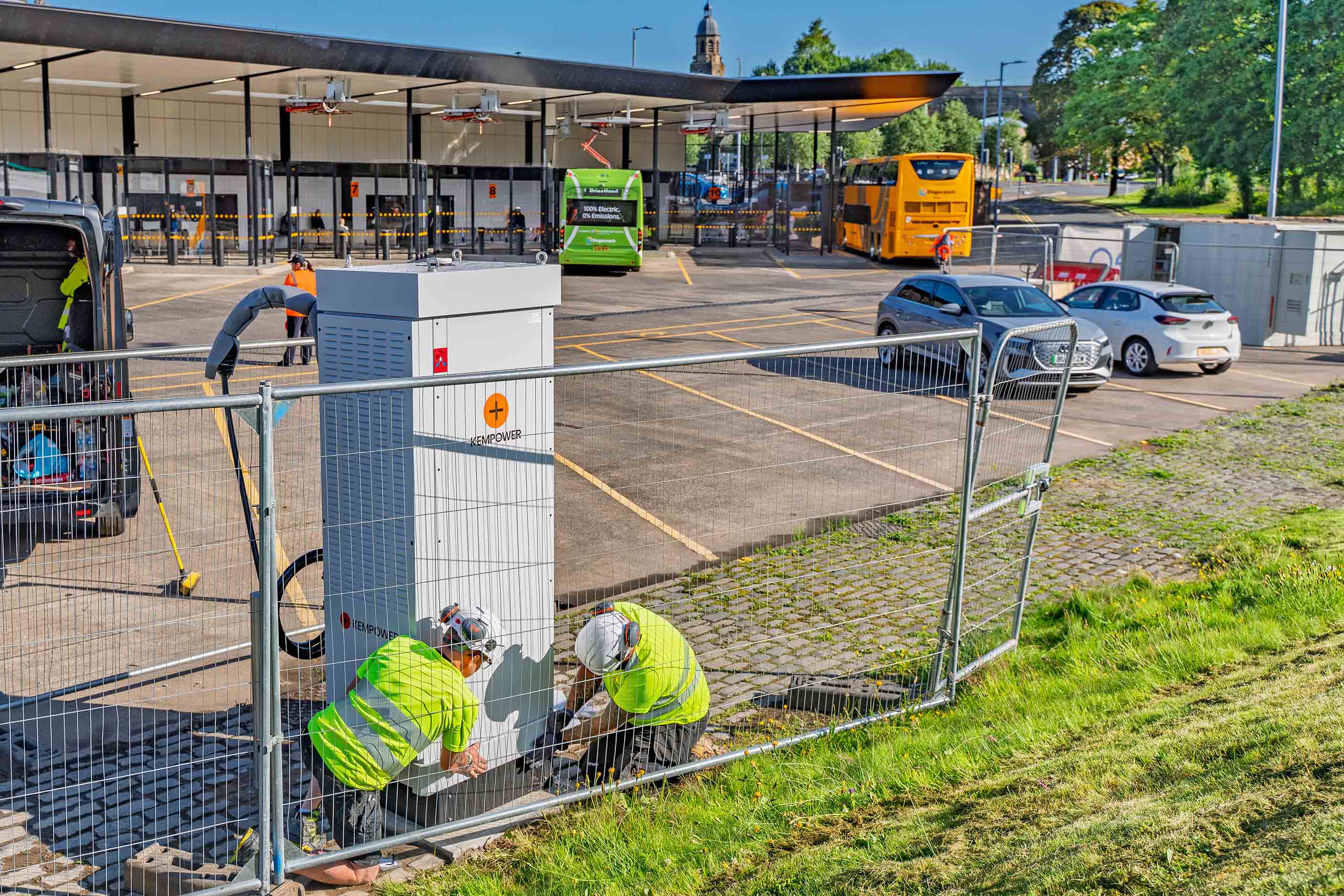 EO Charging installation at Kilmarnock bus depot - engineers installing electric vehicle charging infrastructure for public transport fleet electrification