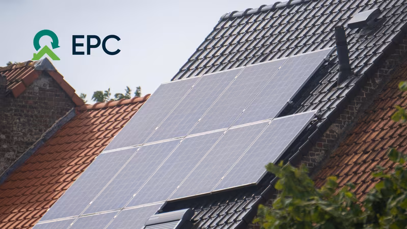 solar panels atop a roof on a grey cloudy day with EPC logo in top left