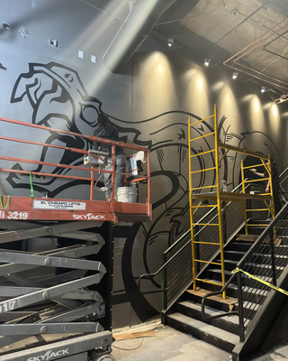 Work in progress on the mural.