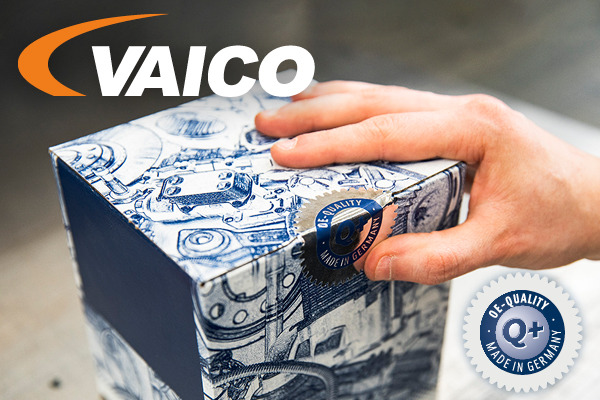 Ein Paket von Vaico mit einer Hand und dem Qualitätssiegel.