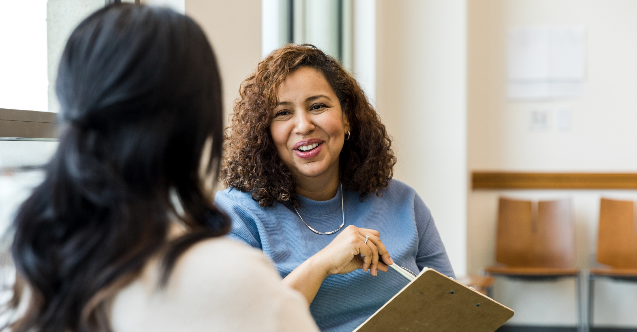 An advisor engaging with a client