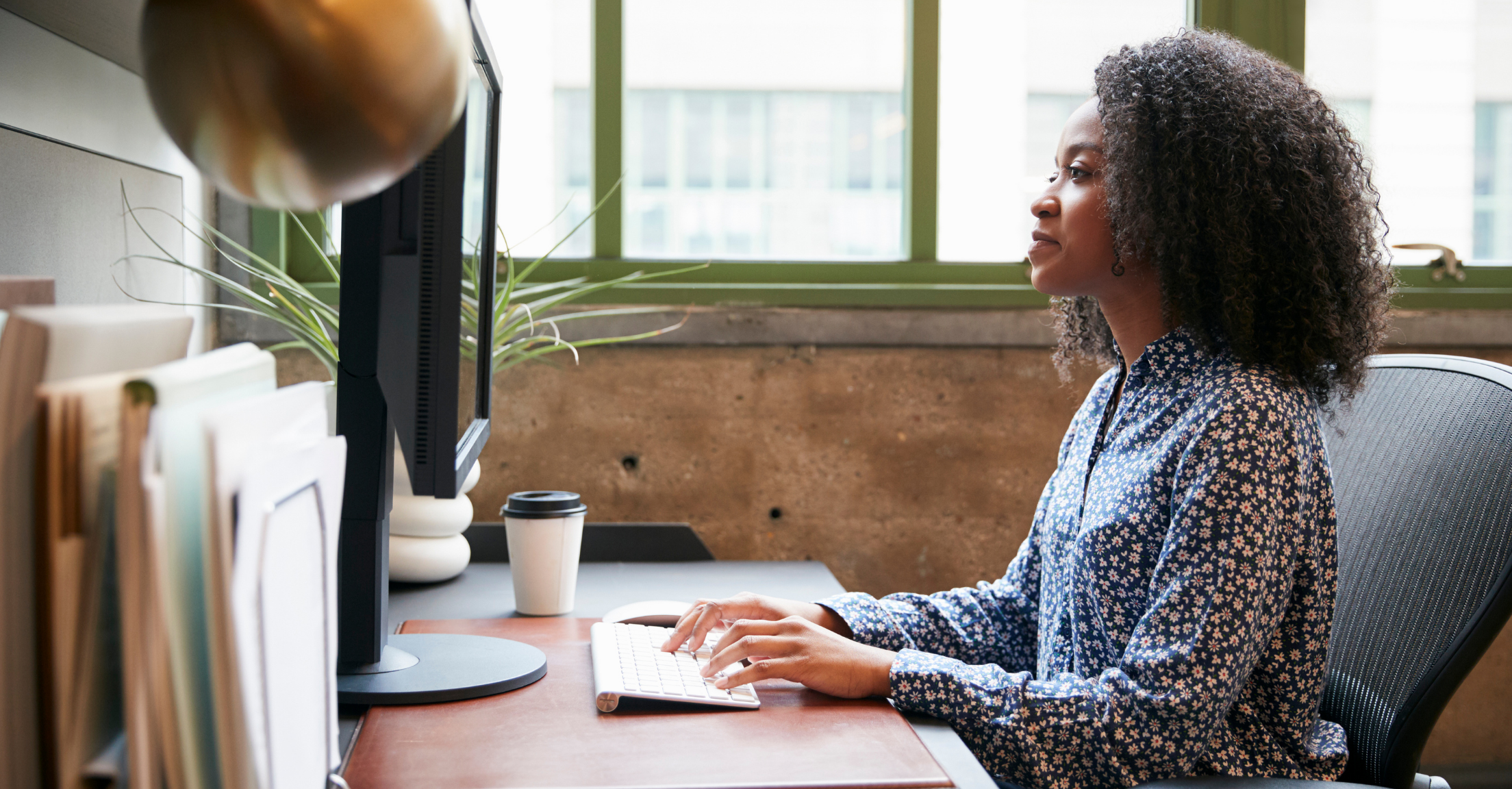 Advisor working on her computer