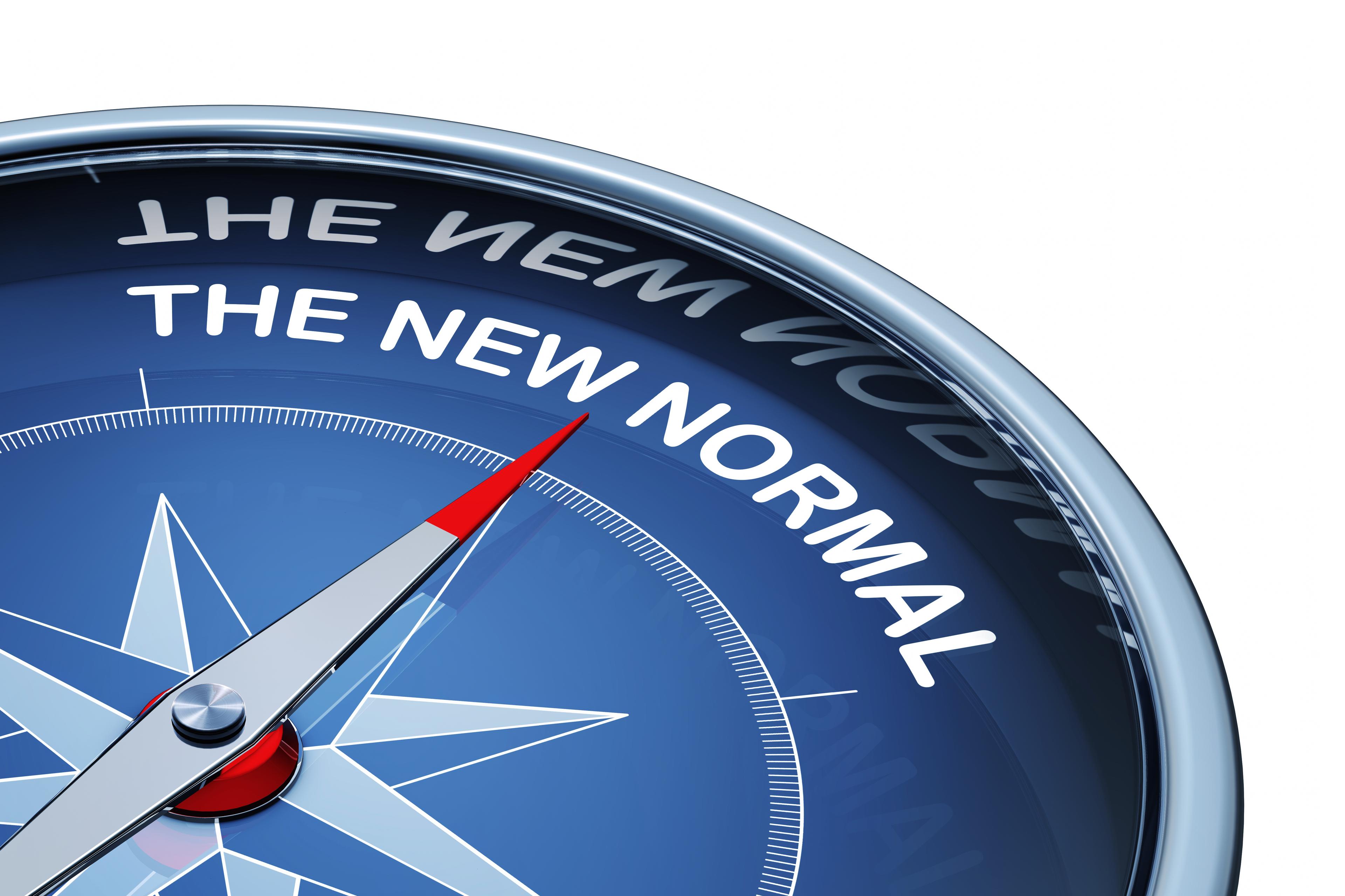 A compass pointing to "the new normal"
