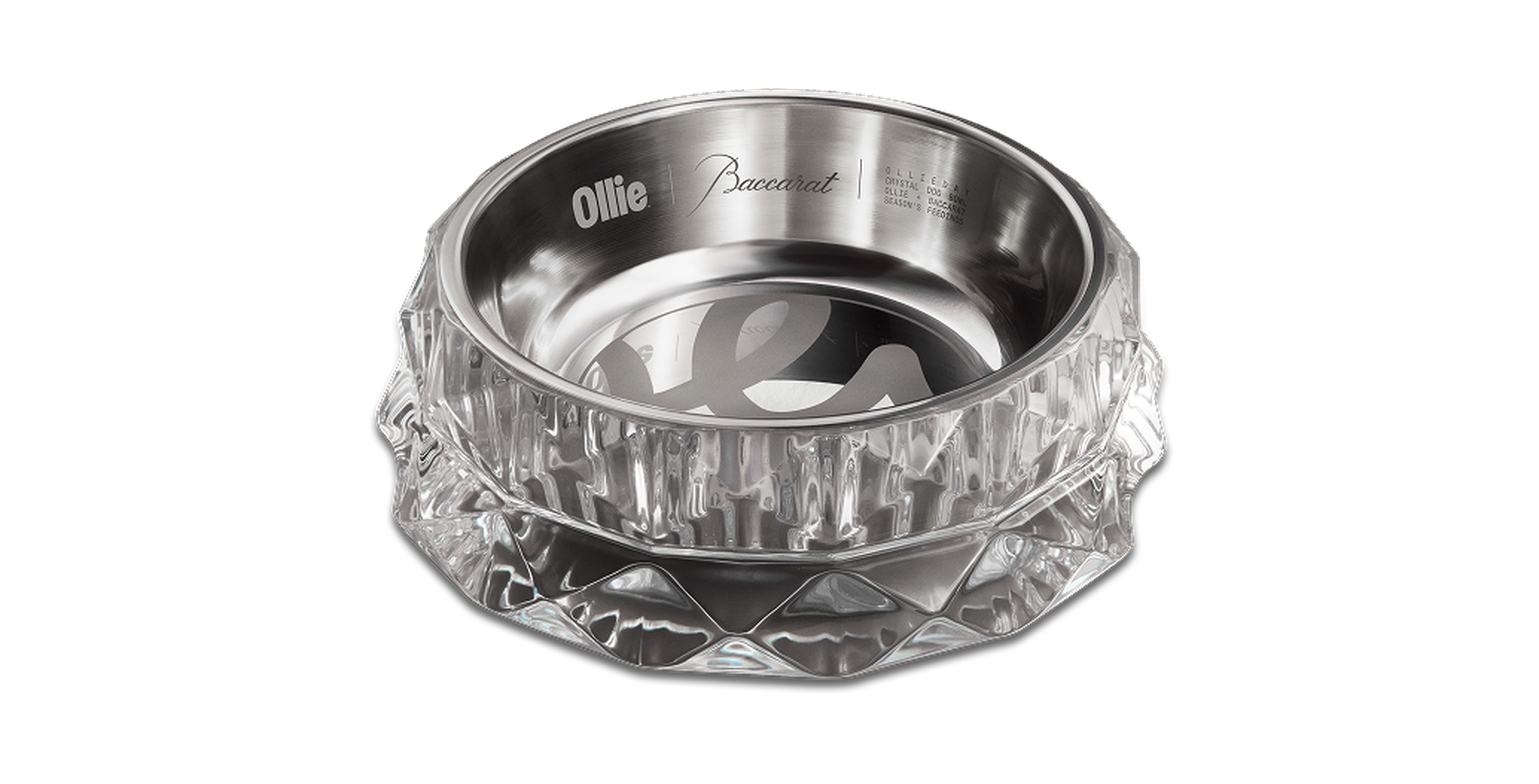 A crystal and metal bowl engraved with "Ollie" and "Baccarat," featuring a patterned exterior and reflective interior.