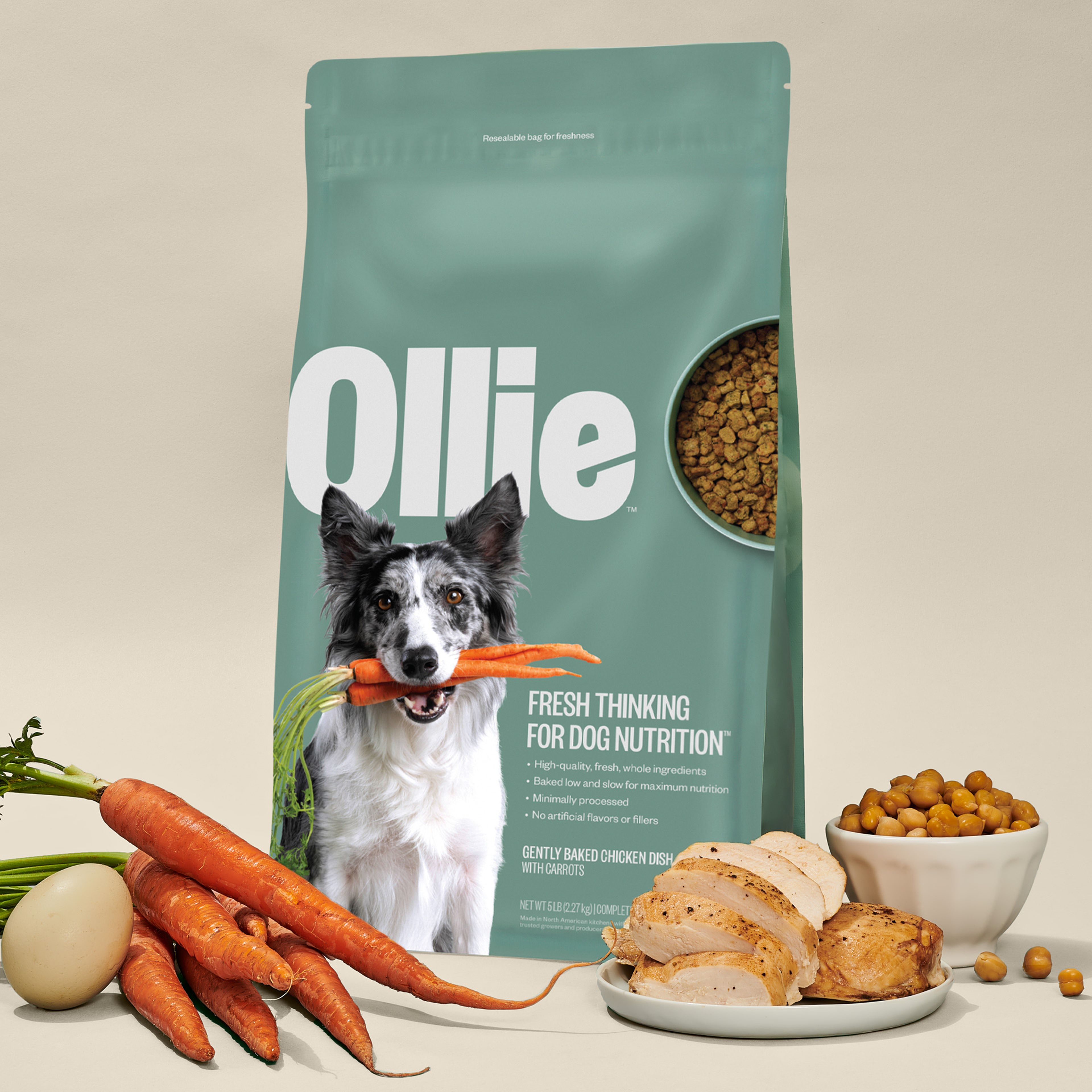 Image showing our baked chicken bag with fresh carrots and chicken breast surrounding