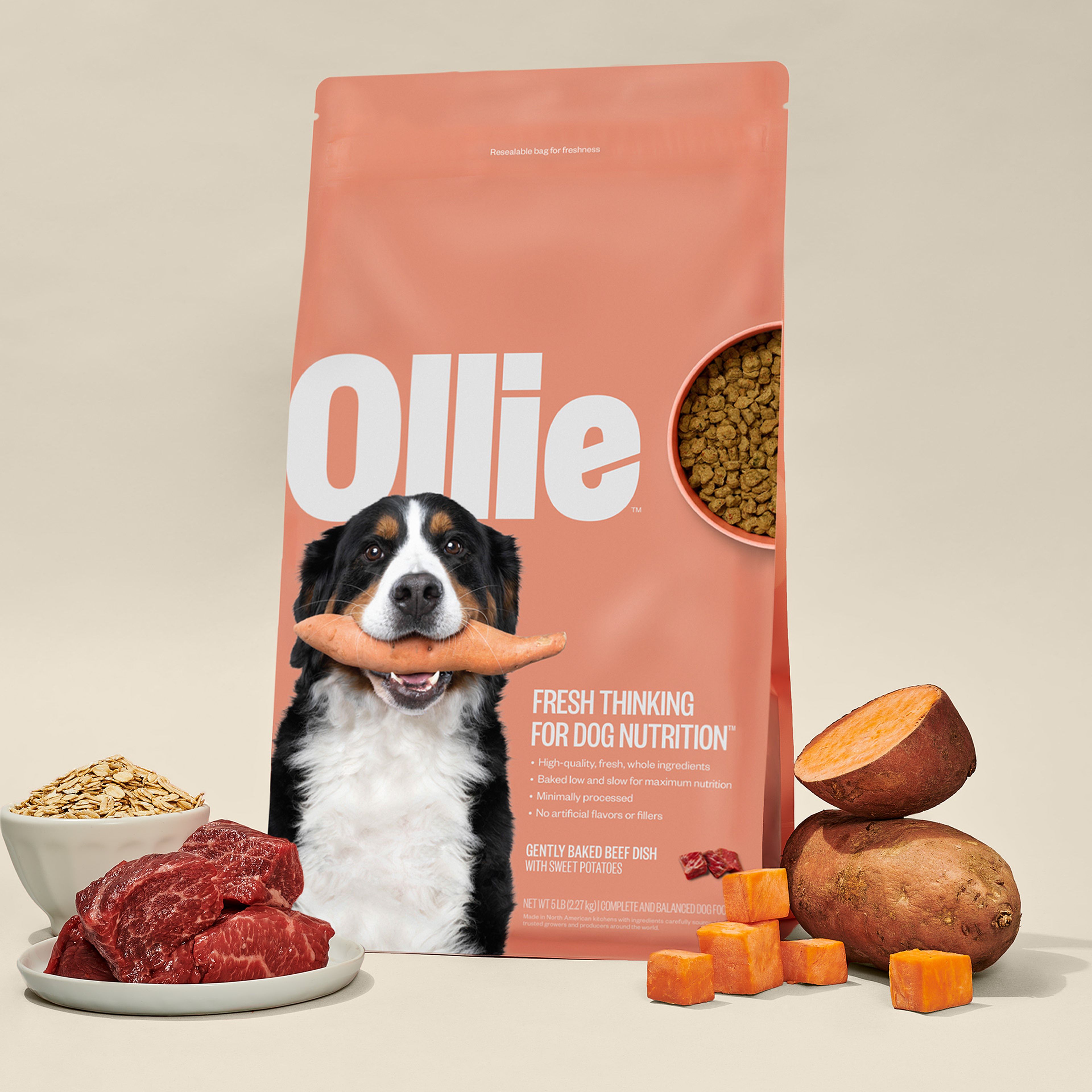 image of our baked beef packaging surround by fresh sweet potatoes and beef