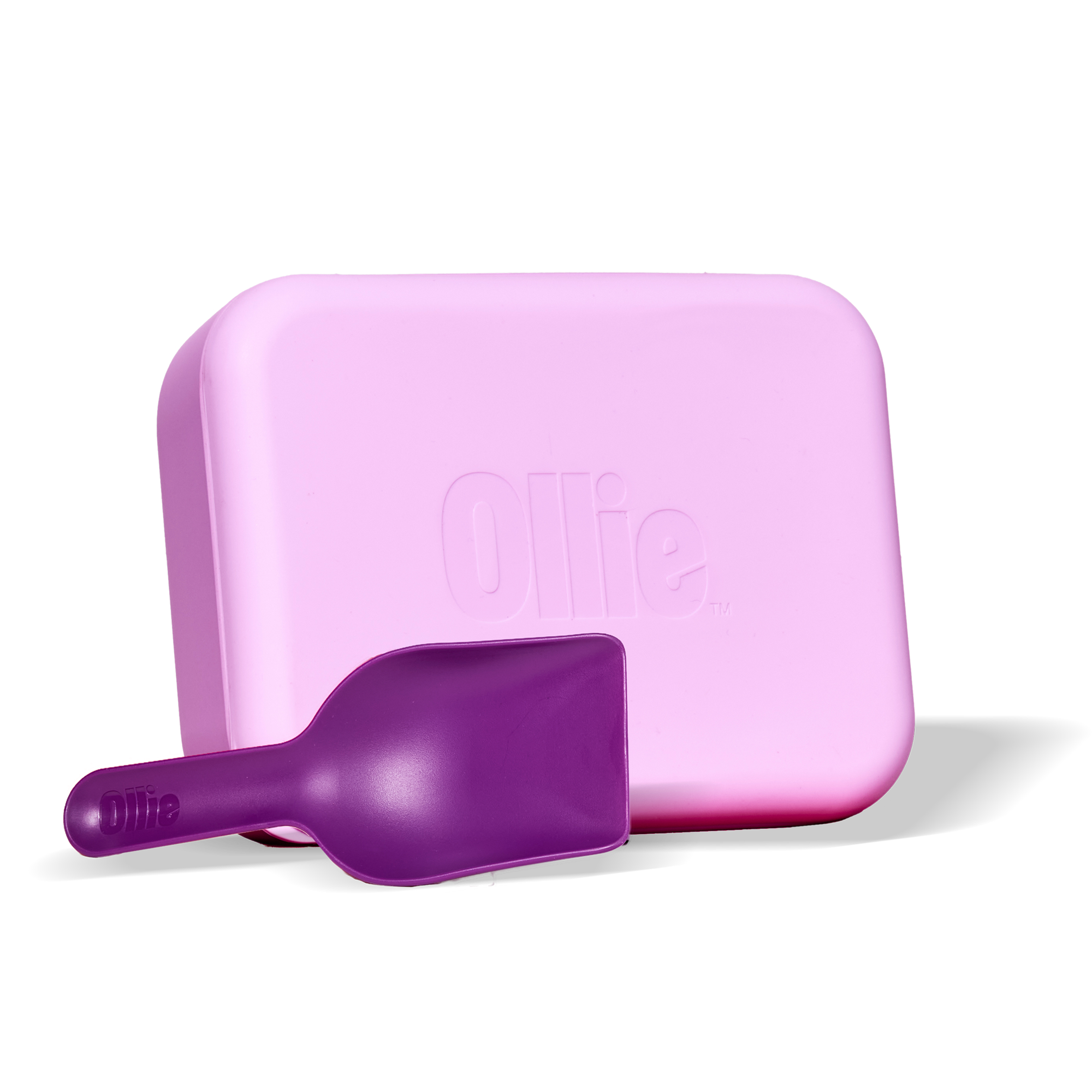 A pink container with "Ollie" embossed on it, accompanied by a purple scoop resting in front.