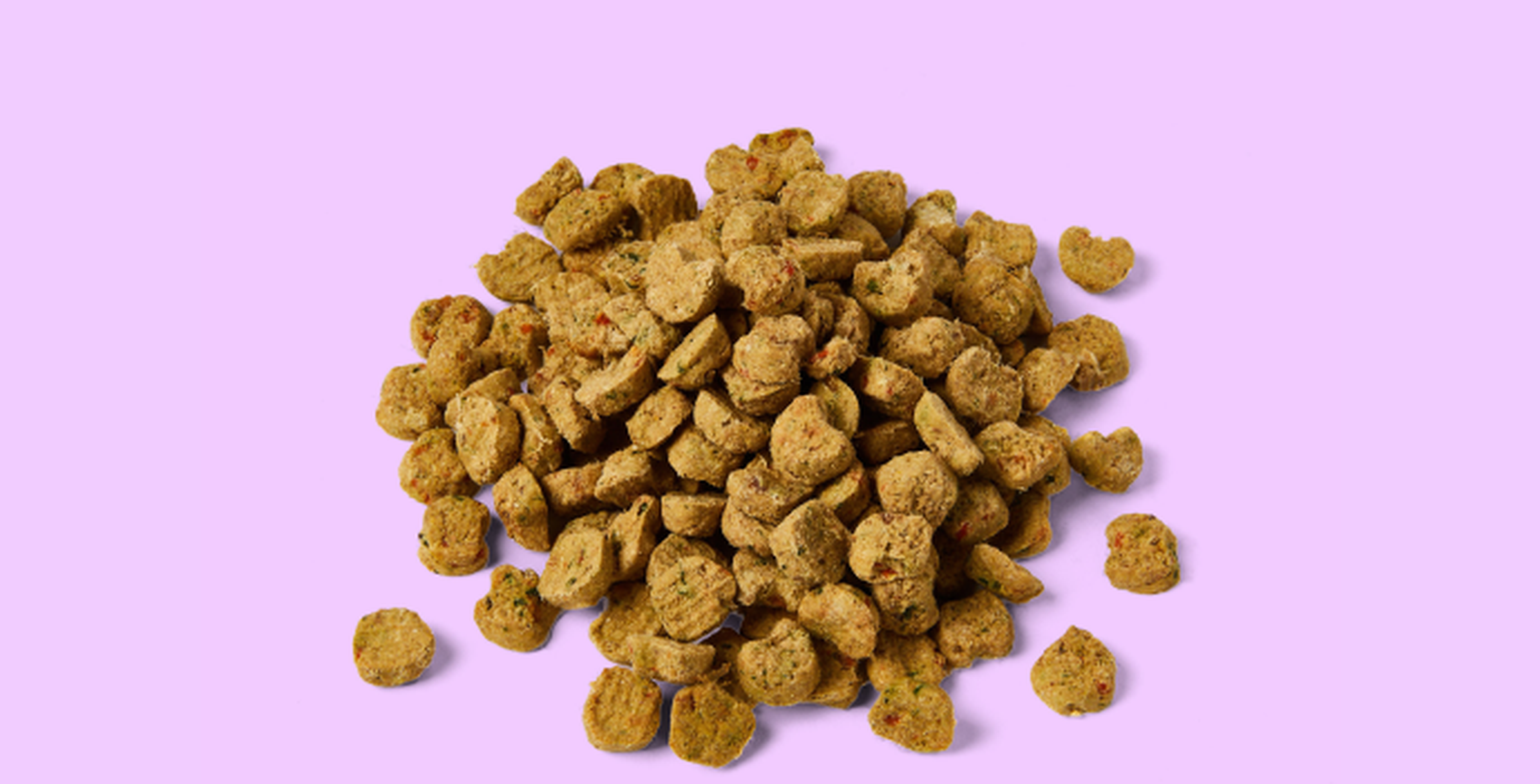 A pile of Ollie Baked on a light purple background.