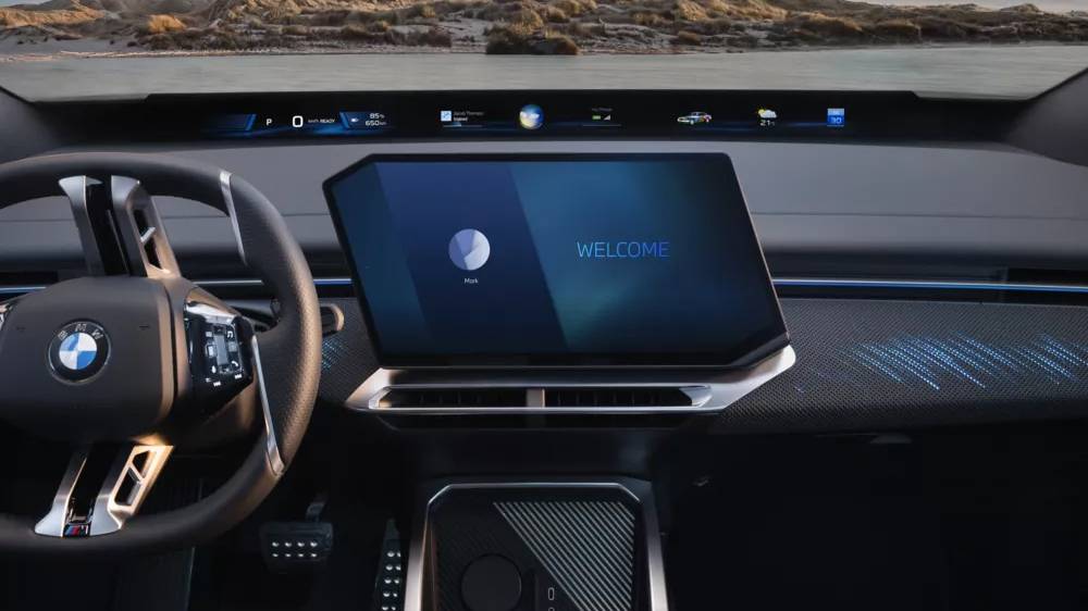 The BMW iX4 interior showcasing the panoramic view screen