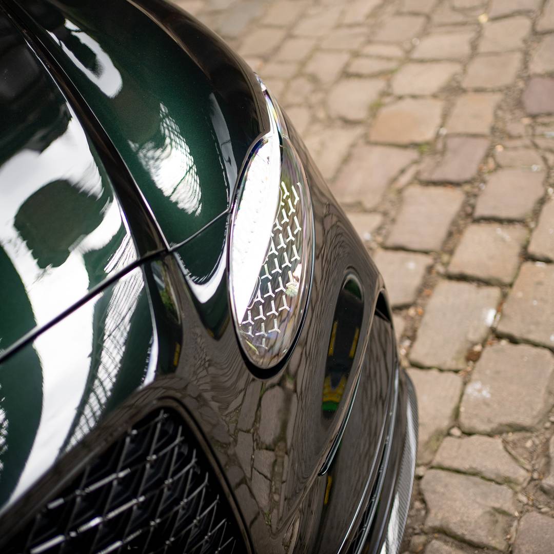 Bentley Flying Spur S 2027 SytnerTV Front headlight showcasing the Green paint
